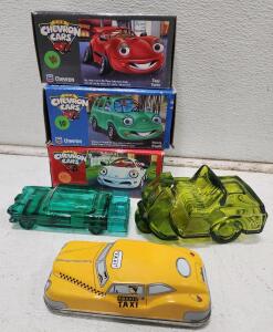 (3) Vintage 1996 Chevron Collectible Cars (1) Fossil Taxi Collectible Tin Box (1) Vintage Avon "Original" After Shave 1958 Ford Edsel Decanter (1) Vintage Avon Golf Cart Bottle "The Avon Open" After Shave Decanter