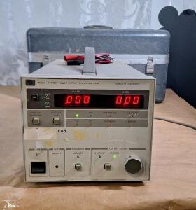 (1) HP 6033A System Power Supply W/ Carry Case