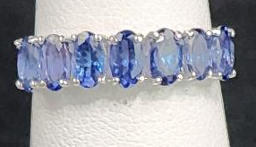 (1) Size 6 1/2 .925 Oscar Friedman Seven Tanzanite Stone Ring