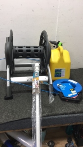 (1) Ames Hose Reel (1) Ideal 50&rsquo; Fishtape (1) 5-Gallon Diesel Can