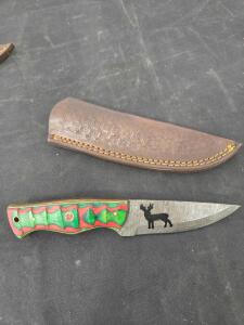 Damascus 4" RainDeer Fixed Blade Steel knife With Red and Green Wooden Handle Please inspect in person.