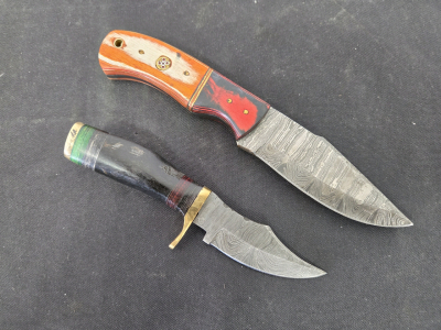 (1)Fixed Blade 4" Damascus Steel knife With Wooden Handle and (1) Fixed Blade 3" Damascus Steel Knife with Horn Handle. please inspect in person.