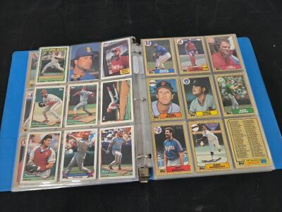 Sports Cards Lot: Blue binder of (25)Sleeves of baseball cards(200+ cars) Jeff Russell, Astros Leaders, Reggie Williams and more, (4)Sleeves of Football cards (approx 18 cards) Shaun Alexander, Darrell Jackson, Bobby Engram and more! Please see photos for