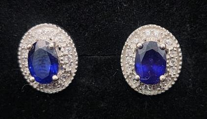 (1) Pair of Oval Sapphire And White Topaz Earrings