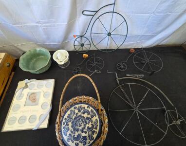 Green ceramic planter, Juicer (Glass), Metal unicycle yard art, my first year picture frame, (2) Spalding tennis rackets, On The Go portable water softener.