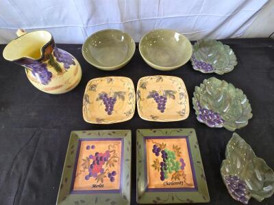 Ceramic Dishes: (3)Leaf shaped plates with grapes, (2) green bowls, (2) square plates with vines and grapes, pitcher with grapes, (2) square plates with green border, grapes in the center 1 says merlot, 1 says chardonnay. Please inspect in person, see ph