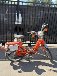 Piaggio Ciao Moped Red, 49cc 2-Stroke Automatic, Classic Italian Pedal-Assist Scooter. Tired need air or replaced.