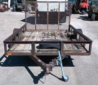12' x 7' Single-axle utility trailer with a wooden deck and a wire mesh rear ramp - 2
