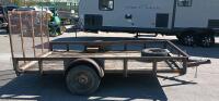 12' x 7' Single-axle utility trailer with a wooden deck and a wire mesh rear ramp - 3