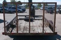 12' x 7' Single-axle utility trailer with a wooden deck and a wire mesh rear ramp - 4