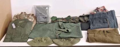 (1) Duffel Bag, (1) Rain Poncho, (4) Assorted Ammo Pouches (2) Hot Weather Hats & Assorted Pieces Of Military Surplus Clothing, Size Large