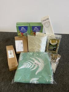 baking and kicthen supplies<br/>egg whisk, cake toppers, fridge deodorants, tea steepers, spice packets, silicon fondant mold, table cloth, and silverware