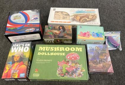 Mixed Lot: UGears Roadster VM-01, Flexible Race Track, Lord of the Rings, Games, Puzzles & Kits