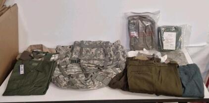 (1) Molle II Rucksack, (1) Rothco 19" Heavy Weight Canvas Shoulder Duffel Bag, (1) USGI Duffel Bag & Assorted Pieces Of Military Surplus Clothing, Size Large