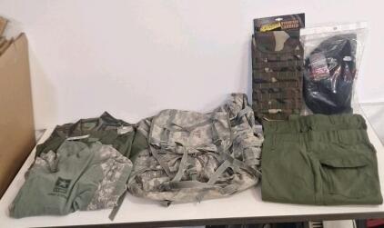 (1) Molle II Rucksack, (1) Voodoo Tactical Hydration Carrier, (1) Rothco 19" Heavy Weight Canvas Shoulder Duffel Bag & Assorted Pieces Of Military Surplus Clothing, Size Large