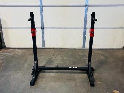 AKYEN Adjustable Squat Rack Stands, 850 lb Capacity, Spotter Arms, Dip Handles, Black/Red