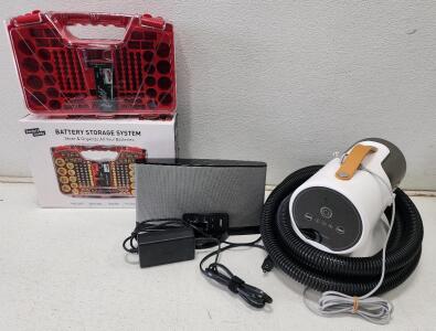 (1) Bose SoundDock Digital Music System (1) Ontel Battery Daddy Storage Case (1) AIRROBO PG100 Pet Grooming Vacuum