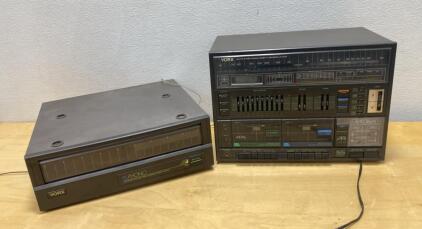 Yorx Stereo System with AM/FM, Dual Cassette Recorder, ORC1 Automatic Return Turntable, Black ( Powers On )