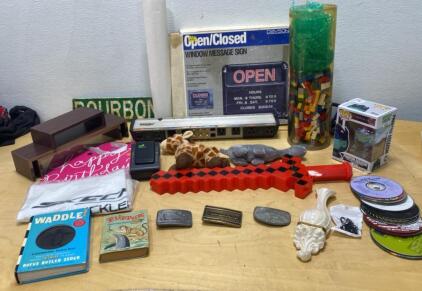 Mixed Collectibles Lot: Smith & Wesson, Bridgestone, Raleigh Buckles, Funko Pop, LEGO, Sign