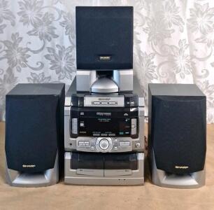 (1) Vintage Sharp CD-C3800 Mini Component System W/ (3) Speakers, 3-CD Player, (2) Cassette Tapes & AM/FM Stereo