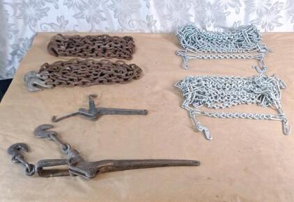 (2) Vintage Chain Load Binders, (1) Large, (1) Small, (1) 12' 5/16" Chain W/Hooks, (1) 10' 5/16" Chain W/Hooks & (1) Pair Of Tire Chains, Size Unknown