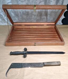 (1) Vintage 16" Sugar Beet Hook Knife, (1) Handmade 19" Decorative Knife & (1) Wooden Display Case W/ Glass Top, 24"L x 16"W