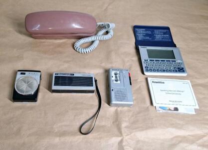 (1) Vintage Sony Portable AM Radio, (1) Vintage Realistic Portable AM Radio, (1) Sony Microcassette Recorder, (1) Franklin Speaking Dictionary & (1) Vintage Conair Phone
