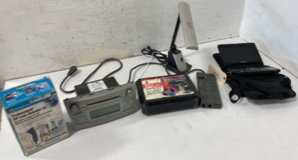 Audiovox Portable DVD Player, Audible Alarm Surge Protector, Toyota CD Player, Pro UV Leak Detector, & Tire Chains