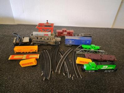 Train Parts And Pieces Including Train Power Pack, Box Cars And Railroad Pieces