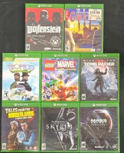 Lot of 8 Xbox One Games: Skyrim, Tomb Raider, Mass Effect, LEGO Marvel, Wolfenstein, Tropico 5