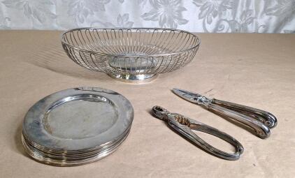 (1) Vintage 12" Oval Silver Plate Wire Basket, (7) Vintage 6" Silver Plate Saucers & (2) Vintage Silver Plate Nut Crackers
