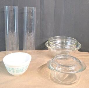 (1) Vintage Pyrex Bowl, (2) Vintage Pyrex 14" x 3-3/4" Baking Tubes W/ Metal Racks, (1) Cassarole Dish W/ Lid & (3) Assorted Sized Glass Mixing Bowls