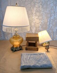 (1) Vintage Table Lamp W/Lighted Base, (1) Wall Lamp, (1) Small Wooden Stand & (1) Fabric Tablecloth