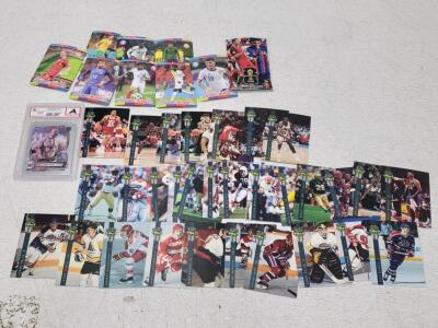 Assorted Sports Cards & Memorabilia including: WWE Wrestler Sheamus, Jason Smith, Rocket Ismail, Malik Sealy, & More!