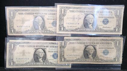 Four 1957 Series $1 Silver Certificates &ndash; Blue Seal, Multiple Signatories, Circulated Notes
