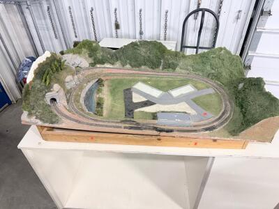 N Scale Double Loop Model Railroad Layout with Tunnel, River, Road System, and Scenic Terrain &ndash; 4x2 ft