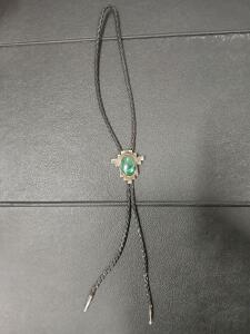 Black Braided Leather Bolo Tie with Green Cabochon Stone and Ornate Metal Pendant