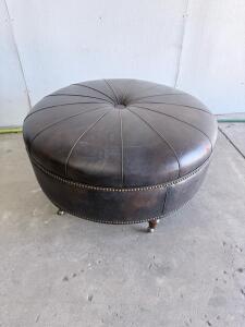 Round Dark Brown Leather Ottoman with Nailhead Trim and Casters