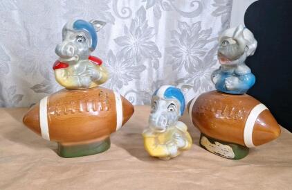 (2) Vintage Jim Beam Football Decanters W/ (2) Donkey Stopper Heads & (1) Elephant Stopper Head