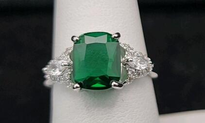 (1) Size 8 Faceted Emerald Cut Ring