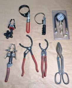 (2) Valve Compression Tools, (4) Assorted Oil Filter Wrenches, (1) Pair Of Tin Snips & (1) Compression Testing Guage