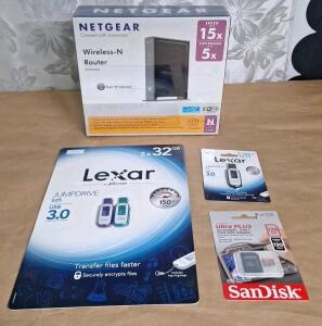 (1) Netgear WNR2000 Wireless-N Router, (1) 2-Pack Of Lexar 32GB USB 3.0 Flash Drives, (1) Lexar 128GB USB 3.0 Flash Drive & (1) SanDisk 128GB MicroSDXC Card