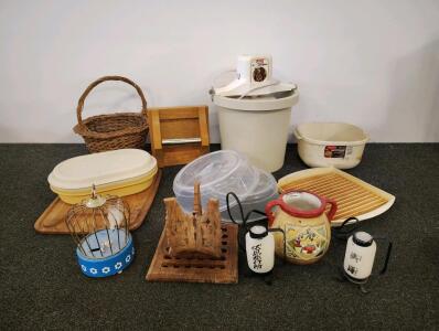 House lot including icecream maker, basket, cutting board, toilet paper roller holder, microwave plate covers, and more