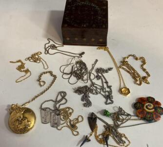 Vintage Gold-Tone Pocket Watch with Eagle Design, Assorted Necklaces, Pendants, Chains, and Decorative Jewelry Box