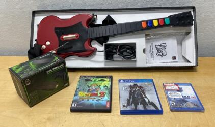 Video Game Lot: Game Stick Lite Console, Guitar Hero SG Controller, 3 PlayStation Games