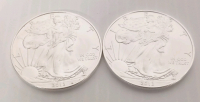 (2) 1 oz. Fine Silver One Dollar Coins