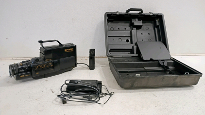 Sharp ViewCam L250 VHS-C Camcorder with 12x Optical Zoom, Charger & Case, Made in Japan. battery cord does not work for camera.