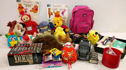 Assorted Plush Toys & Collectibles Lot: Teletubby Po, Pikachu, VHS Sets, IGIA Pink Backpack