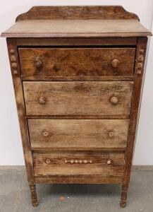 Antique Wooden 4-Drawer Chest With Turned Legs And Decorative Details