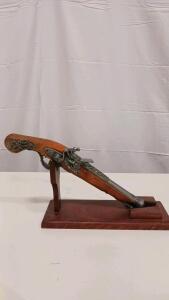 Decorative Flintlock Pistol Replica with Ornate Scrollwork